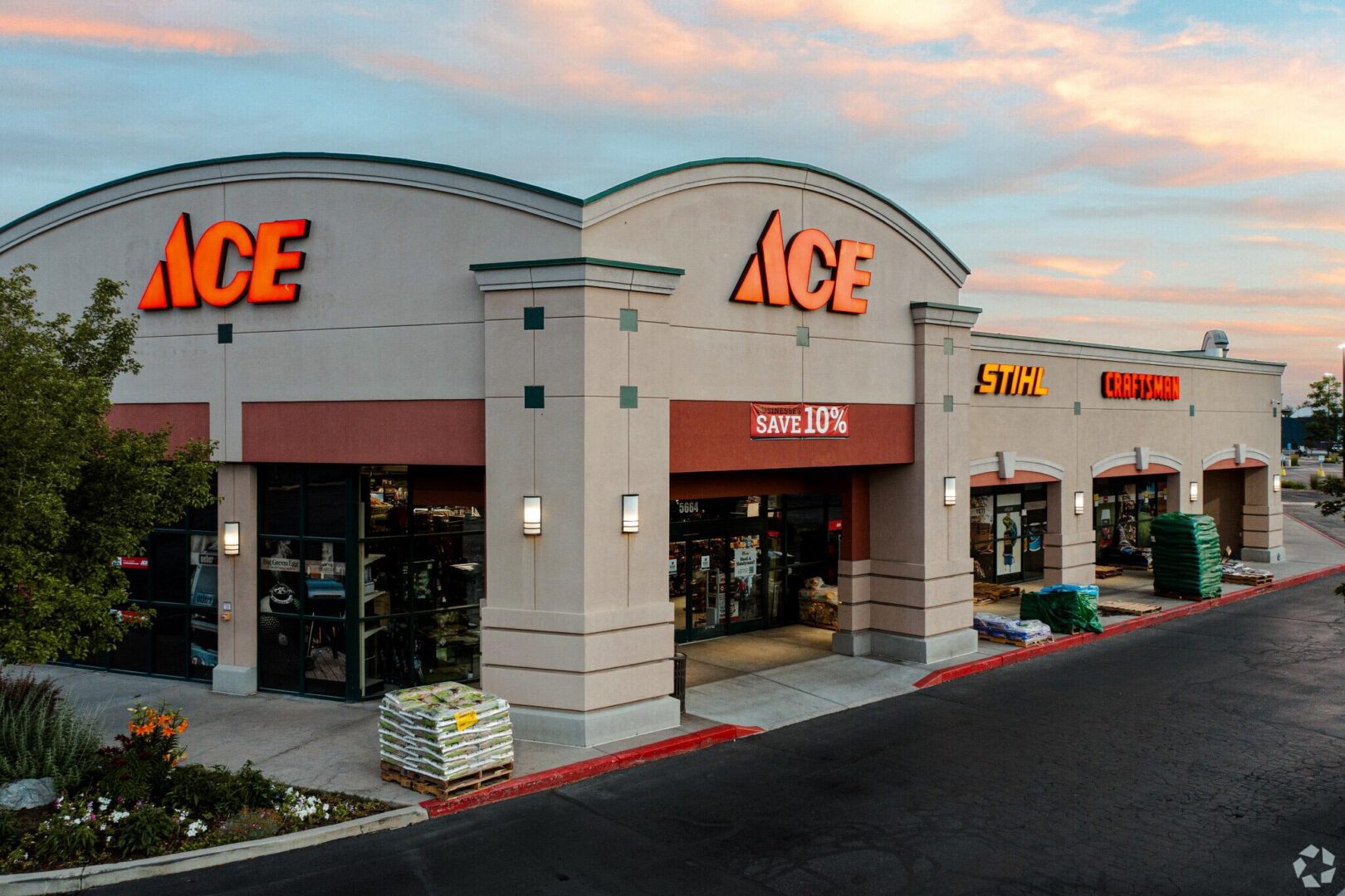 A store front of an ace hardware store.