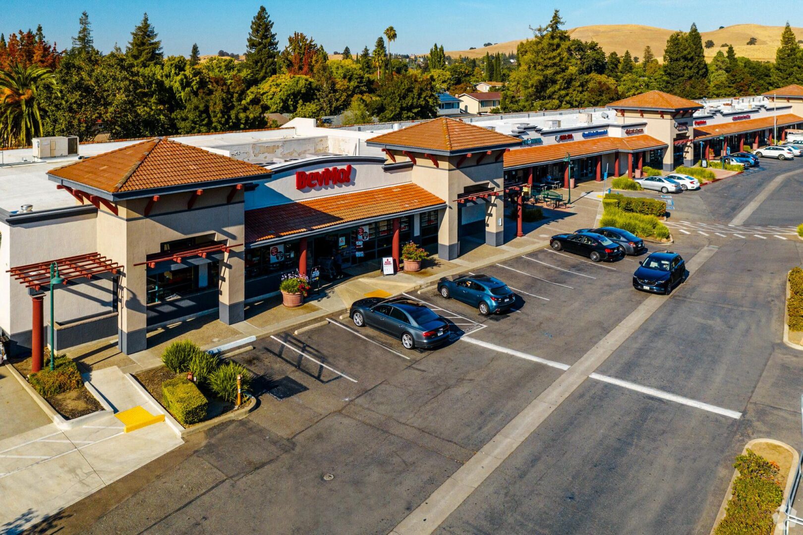 A parking lot with cars parked on it