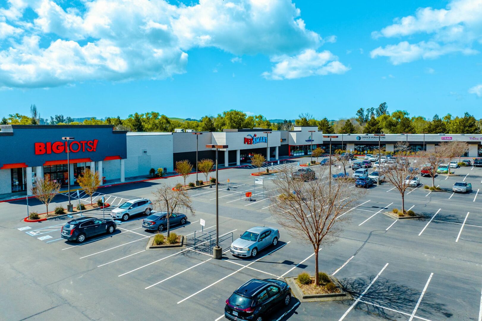 A parking lot with cars parked in it