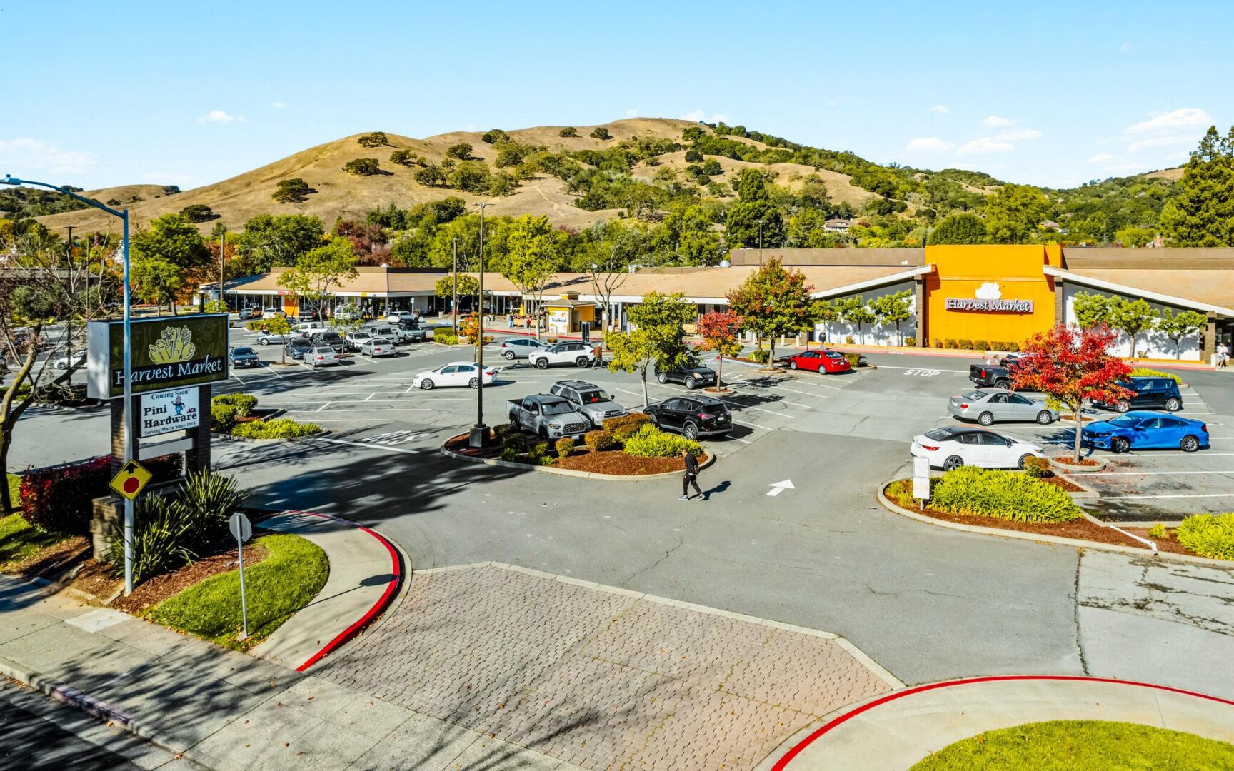 A parking lot with cars parked in it