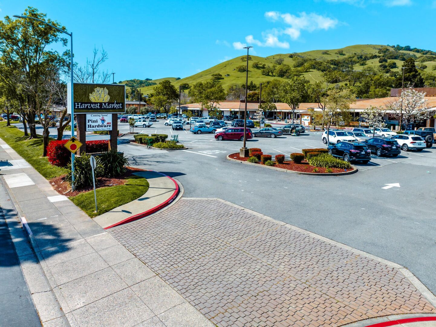 A parking lot with cars parked in it.