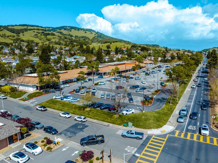 A parking lot with cars parked in it