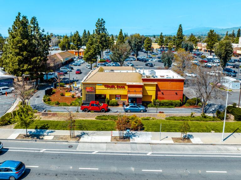 A parking lot with cars parked in it